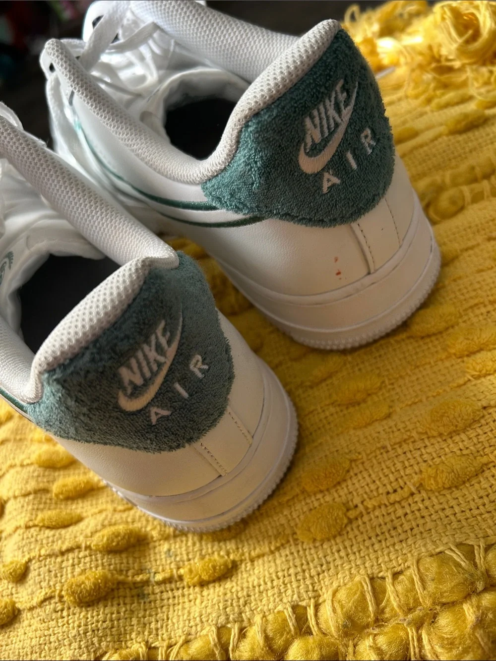 Nike White Low-Top Sneakers with Green Swoosh